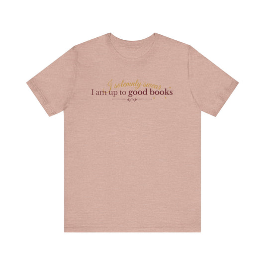 "I solemnly swear I am up to good books"; in a clean and enchanting design on a lightweight unisex tee